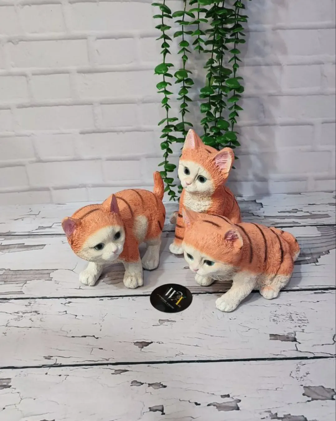مجسمه ی سه گربه ی بازیگوش